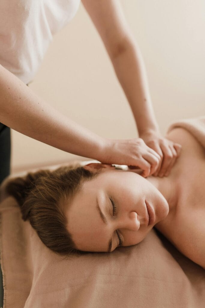 Almond Oil Woman enjoying a soothing massage in a serene spa setting. Ultimate relaxation.